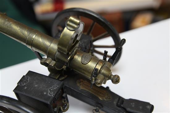 A brass and painted steel working model of an 1883 gatling gun, 14in.